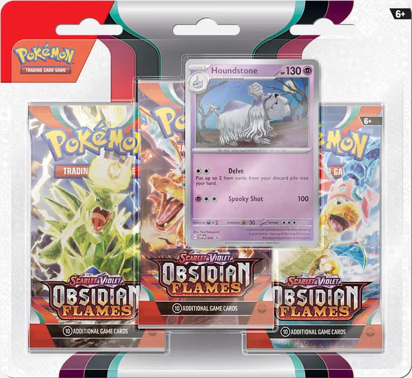 Pokémon trading card game packs with a card featuring a ghostly creature.